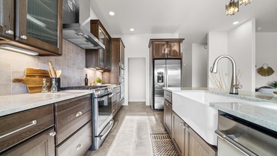 Introducing this beautifully updated ranch style home adjacent on The Golf Club At Redlands Mesa in Colorado - for sale on GolfHomes.com, golf home, golf lot