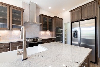 Introducing this beautifully updated ranch style home adjacent on The Golf Club At Redlands Mesa in Colorado - for sale on GolfHomes.com, golf home, golf lot