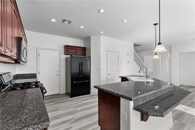 Updated, move-in ready two-story home located in the Rhodes on Rhodes Ranch Golf Club in Nevada - for sale on GolfHomes.com, golf home, golf lot