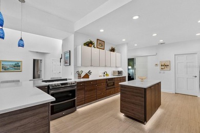 Stunning contemporary architecture frames the wide open interior on Plantation Bay Golf and Country Club in Florida - for sale on GolfHomes.com, golf home, golf lot