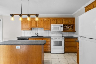 This 4-bed, 3-bath family home is in North Glenmore's heart on  in  - for sale on GolfHomes.com, golf home, golf lot