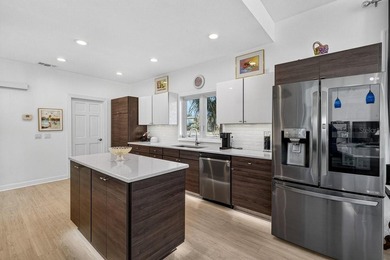 Stunning contemporary architecture frames the wide open interior on Plantation Bay Golf and Country Club in Florida - for sale on GolfHomes.com, golf home, golf lot