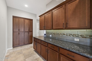 Tucked away on a quiet cul-de-sac in the sought-after Trilogy at on Vista Verde Golf Course in Arizona - for sale on GolfHomes.com, golf home, golf lot