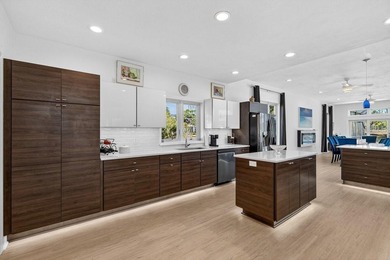 Stunning contemporary architecture frames the wide open interior on Plantation Bay Golf and Country Club in Florida - for sale on GolfHomes.com, golf home, golf lot