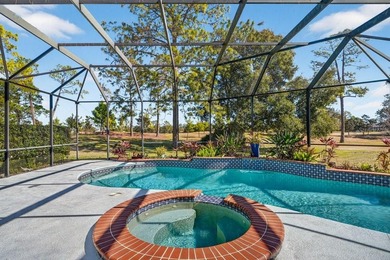 Stunning contemporary architecture frames the wide open interior on Plantation Bay Golf and Country Club in Florida - for sale on GolfHomes.com, golf home, golf lot