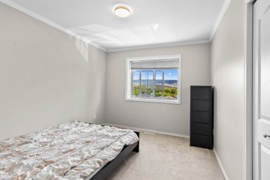 This 4-bed, 3-bath family home is in North Glenmore's heart on  in  - for sale on GolfHomes.com, golf home, golf lot