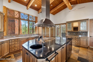 Perched on 1.4 wooded acres is a stunning Sedona red-rock home on Capital Canyon Club in Arizona - for sale on GolfHomes.com, golf home, golf lot
