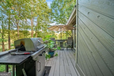 Tucked within the trees of the desirable Rivermont community on Rivermont Golf and Country Club in Georgia - for sale on GolfHomes.com, golf home, golf lot