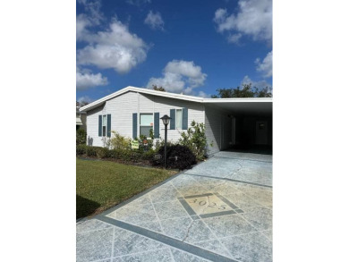 Manufactured Home on Leased Land with Lot Rent. Seek tranquility on Whisperwood Golf Course in Florida - for sale on GolfHomes.com, golf home, golf lot