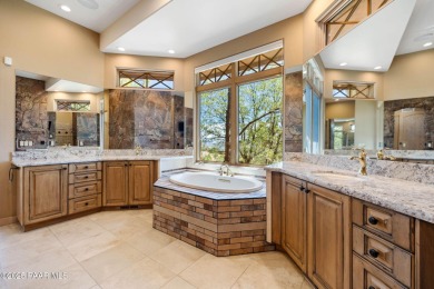 Perched on 1.4 wooded acres is a stunning Sedona red-rock home on Capital Canyon Club in Arizona - for sale on GolfHomes.com, golf home, golf lot