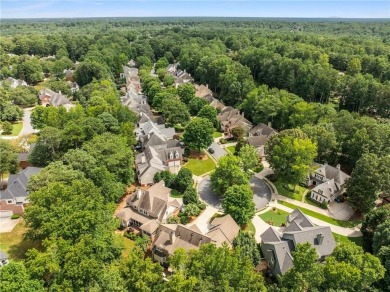 Nestled on a quiet cul-de-sac in the heart of Windward, this on The Golf Club of Georgia in Georgia - for sale on GolfHomes.com, golf home, golf lot