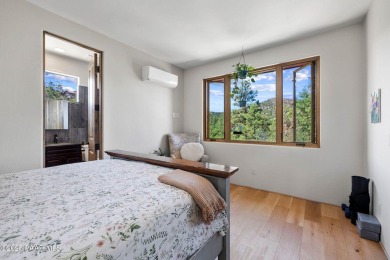 Perched on 1.4 wooded acres is a stunning Sedona red-rock home on Capital Canyon Club in Arizona - for sale on GolfHomes.com, golf home, golf lot