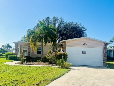 Discover Your New Home! This spacious two-bedroom, two-bath home on Pine Lakes Country Club in Florida - for sale on GolfHomes.com, golf home, golf lot
