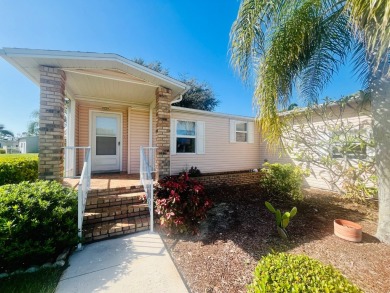 Discover Your New Home! This spacious two-bedroom, two-bath home on Pine Lakes Country Club in Florida - for sale on GolfHomes.com, golf home, golf lot