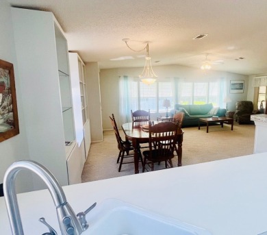 Discover Your New Home! This spacious two-bedroom, two-bath home on Pine Lakes Country Club in Florida - for sale on GolfHomes.com, golf home, golf lot