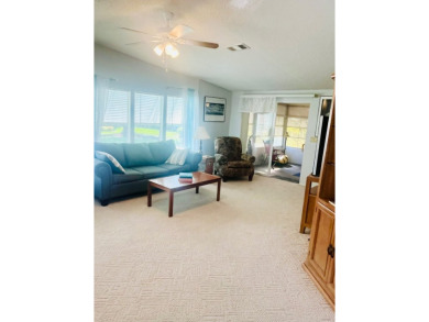 Discover Your New Home! This spacious two-bedroom, two-bath home on Pine Lakes Country Club in Florida - for sale on GolfHomes.com, golf home, golf lot