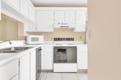PRICED TO SELL! Enjoy this 2 bedroom lakefront condo with large on Poinciana Golf Club in Florida - for sale on GolfHomes.com, golf home, golf lot
