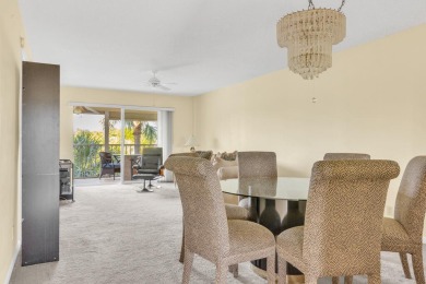 PRICED TO SELL! Enjoy this 2 bedroom lakefront condo with large on Poinciana Golf Club in Florida - for sale on GolfHomes.com, golf home, golf lot