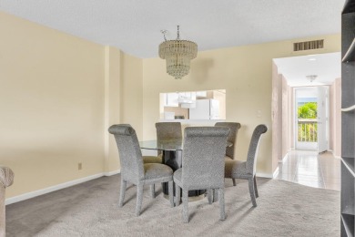 PRICED TO SELL! Enjoy this 2 bedroom lakefront condo with large on Poinciana Golf Club in Florida - for sale on GolfHomes.com, golf home, golf lot