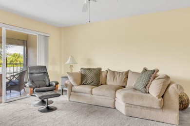 PRICED TO SELL! Enjoy this 2 bedroom lakefront condo with large on Poinciana Golf Club in Florida - for sale on GolfHomes.com, golf home, golf lot