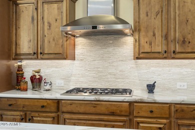 Prepare to be pleased with this ever so popular Treviso model on Tuscany Falls At Pebble Creek in Arizona - for sale on GolfHomes.com, golf home, golf lot