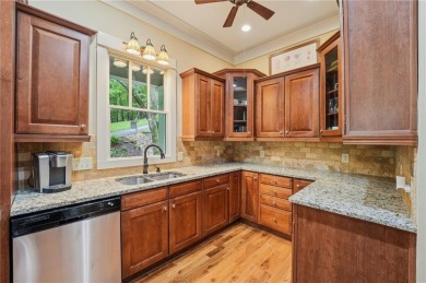 Nestled at the end of a quiet cul-de-sac, this five-bedroom on Big Canoe Golf Club - Cherokee in Georgia - for sale on GolfHomes.com, golf home, golf lot