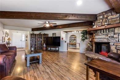 Welcome to this delightful ranch-style home, where stone accents on Bella Vista Country Club - Berksdale in Arkansas - for sale on GolfHomes.com, golf home, golf lot