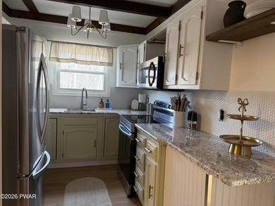 Like New Modern Chalet with 4 Bedrooms and 2 Full Bathrooms in on The Hideout Golf in Pennsylvania - for sale on GolfHomes.com, golf home, golf lot