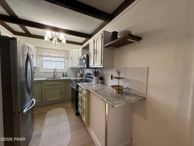 Like New Modern Chalet with 4 Bedrooms and 2 Full Bathrooms in on The Hideout Golf in Pennsylvania - for sale on GolfHomes.com, golf home, golf lot