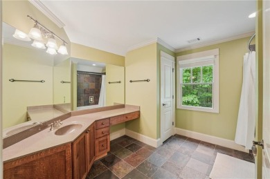 Nestled at the end of a quiet cul-de-sac, this five-bedroom on Big Canoe Golf Club - Cherokee in Georgia - for sale on GolfHomes.com, golf home, golf lot