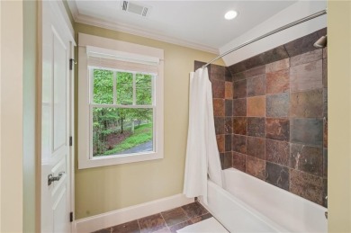 Nestled at the end of a quiet cul-de-sac, this five-bedroom on Big Canoe Golf Club - Cherokee in Georgia - for sale on GolfHomes.com, golf home, golf lot