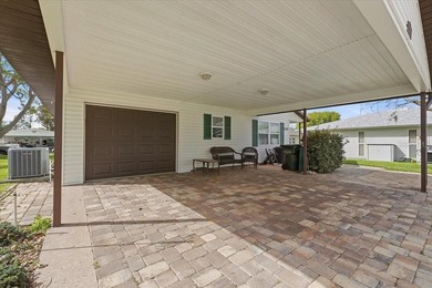 Welcome to easy, low-maintenance living in this charming on Highland Fairways Golf Club in Florida - for sale on GolfHomes.com, golf home, golf lot