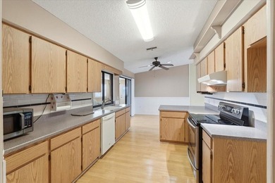 Welcome to easy, low-maintenance living in this charming on Highland Fairways Golf Club in Florida - for sale on GolfHomes.com, golf home, golf lot