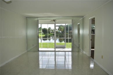 COMPLETE HURRICANE PROTECTION, a KITCHEN WALL HAS BEEN OPENED UP on Sunrise Lakes Phase III in Florida - for sale on GolfHomes.com, golf home, golf lot