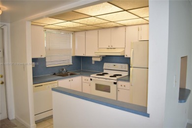 COMPLETE HURRICANE PROTECTION, a KITCHEN WALL HAS BEEN OPENED UP on Sunrise Lakes Phase III in Florida - for sale on GolfHomes.com, golf home, golf lot
