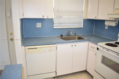 COMPLETE HURRICANE PROTECTION, a KITCHEN WALL HAS BEEN OPENED UP on Sunrise Lakes Phase III in Florida - for sale on GolfHomes.com, golf home, golf lot