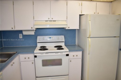 COMPLETE HURRICANE PROTECTION, a KITCHEN WALL HAS BEEN OPENED UP on Sunrise Lakes Phase III in Florida - for sale on GolfHomes.com, golf home, golf lot