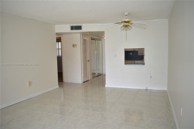 COMPLETE HURRICANE PROTECTION, a KITCHEN WALL HAS BEEN OPENED UP on Sunrise Lakes Phase III in Florida - for sale on GolfHomes.com, golf home, golf lot