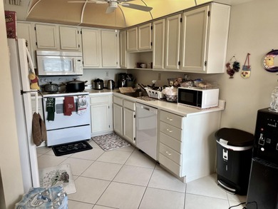 Enjoy sweeping golf course and lake views without the golf on Hammock Bay in Florida - for sale on GolfHomes.com, golf home, golf lot