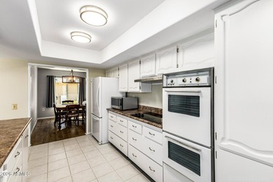 Beautifully updated home in a desirable adult community in Sun on PalmBrook Country Club in Arizona - for sale on GolfHomes.com, golf home, golf lot