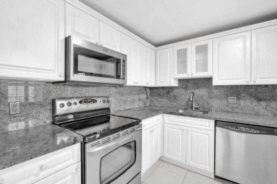 UNBELIEVABLE KING MODEL..2 MASTER SUITES..TOTALLY REMODELED WITH on Palm-Aire Country Club and Resort - Palms in Florida - for sale on GolfHomes.com, golf home, golf lot