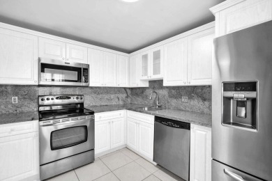 UNBELIEVABLE KING MODEL..2 MASTER SUITES..TOTALLY REMODELED WITH on Palm-Aire Country Club and Resort - Palms in Florida - for sale on GolfHomes.com, golf home, golf lot