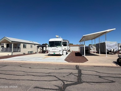 Full concrete slab with full hookups. Nice size shed with on Juniper Ridge R.V. Golf Resort in Arizona - for sale on GolfHomes.com, golf home, golf lot