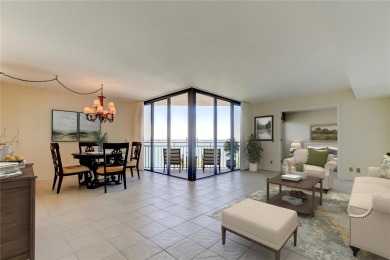 Perched on the top corner of the building, this 2-bedroom on Isla Del Sol Yacht and Country Club in Florida - for sale on GolfHomes.com, golf home, golf lot