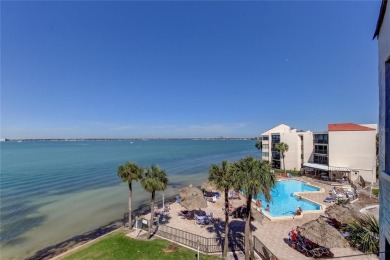 Perched on the top corner of the building, this 2-bedroom on Isla Del Sol Yacht and Country Club in Florida - for sale on GolfHomes.com, golf home, golf lot