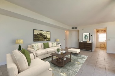 Perched on the top corner of the building, this 2-bedroom on Isla Del Sol Yacht and Country Club in Florida - for sale on GolfHomes.com, golf home, golf lot