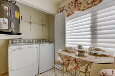 Perched on the top corner of the building, this 2-bedroom on Isla Del Sol Yacht and Country Club in Florida - for sale on GolfHomes.com, golf home, golf lot