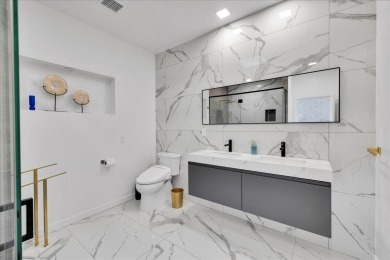 This South Palm Desert residence is truly turnkey--fully on Shadow Mountain Golf Club in California - for sale on GolfHomes.com, golf home, golf lot