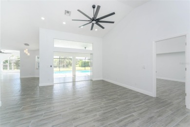Welcome to this stunning, FULLY REMODELED home located in the on Rotonda Golf and Country Club - Long Marsh  in Florida - for sale on GolfHomes.com, golf home, golf lot