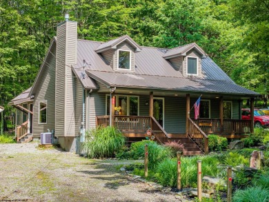 Welcome to 'Nature's Nook', a beautiful cape cod cabin located on Alpine Lake Resort in West Virginia - for sale on GolfHomes.com, golf home, golf lot